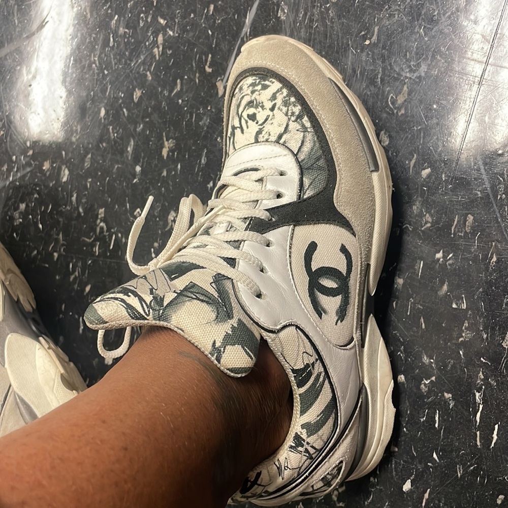 Black and white timeless Chanel sneakers